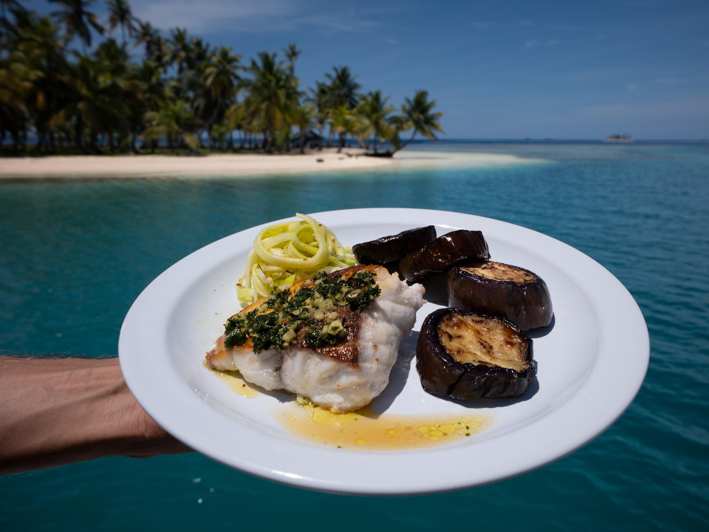 Fresh seafood, often bought directly from these waters and prepared onboard
