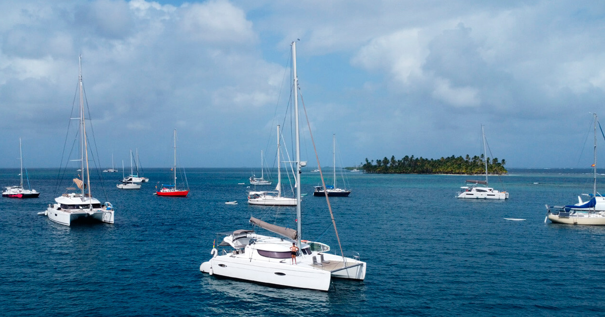 Post card Life on board: Sailboat vs Catamaran