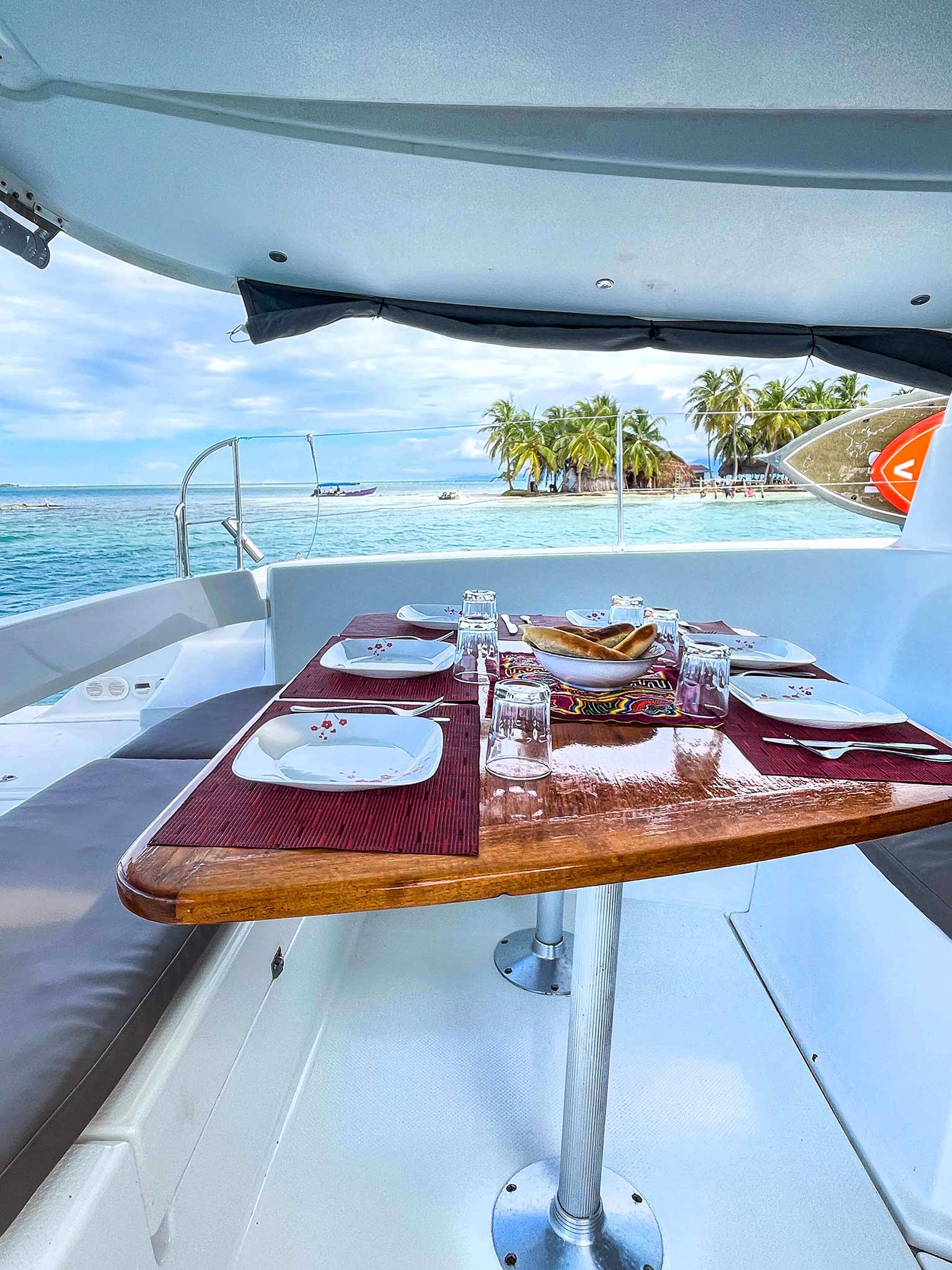 Catamaran in full sail on the ocean Catamaran sailing on open water