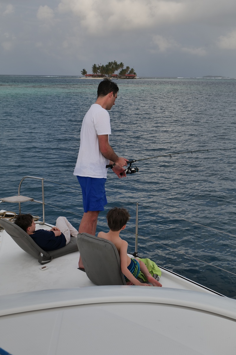 Sailing catamaran during sunset Catamaran at sunset