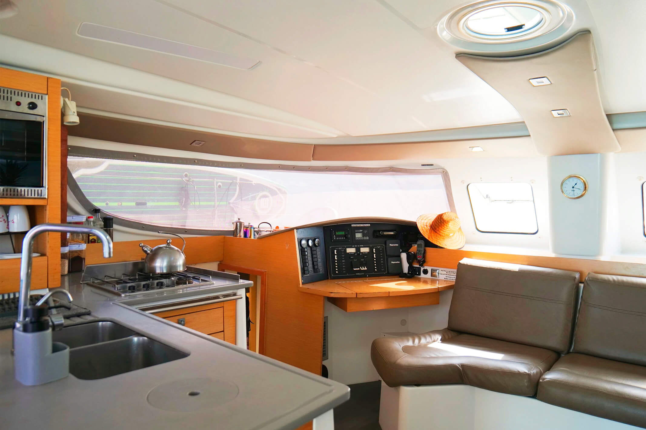 Interior salon of the Lipari 41 catamaran with lounge and dining area